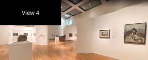 Interior view of the J. Wayne Stark Galleries in the main gallery space. In the distance you can see paintings on the walls and a sculpture in a case.