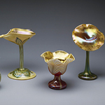 Color image of three glass flower vases.
