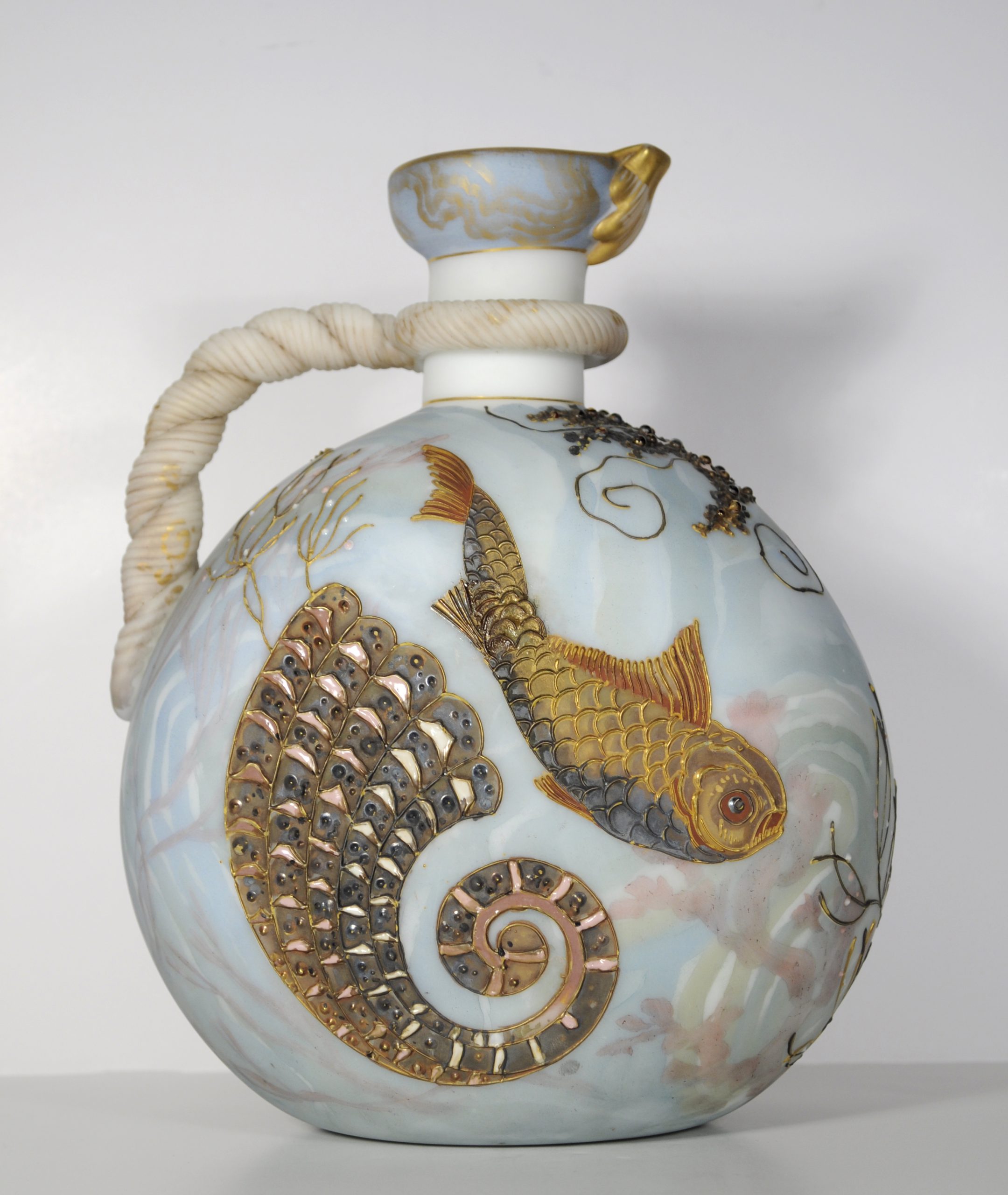 Pitcher. Crown Milano. White blown body enamel decorated with under sea scene with fish and shell. Bead "jewels" on body. Applied twisted rope handle. Interior mouth gold enameled.
