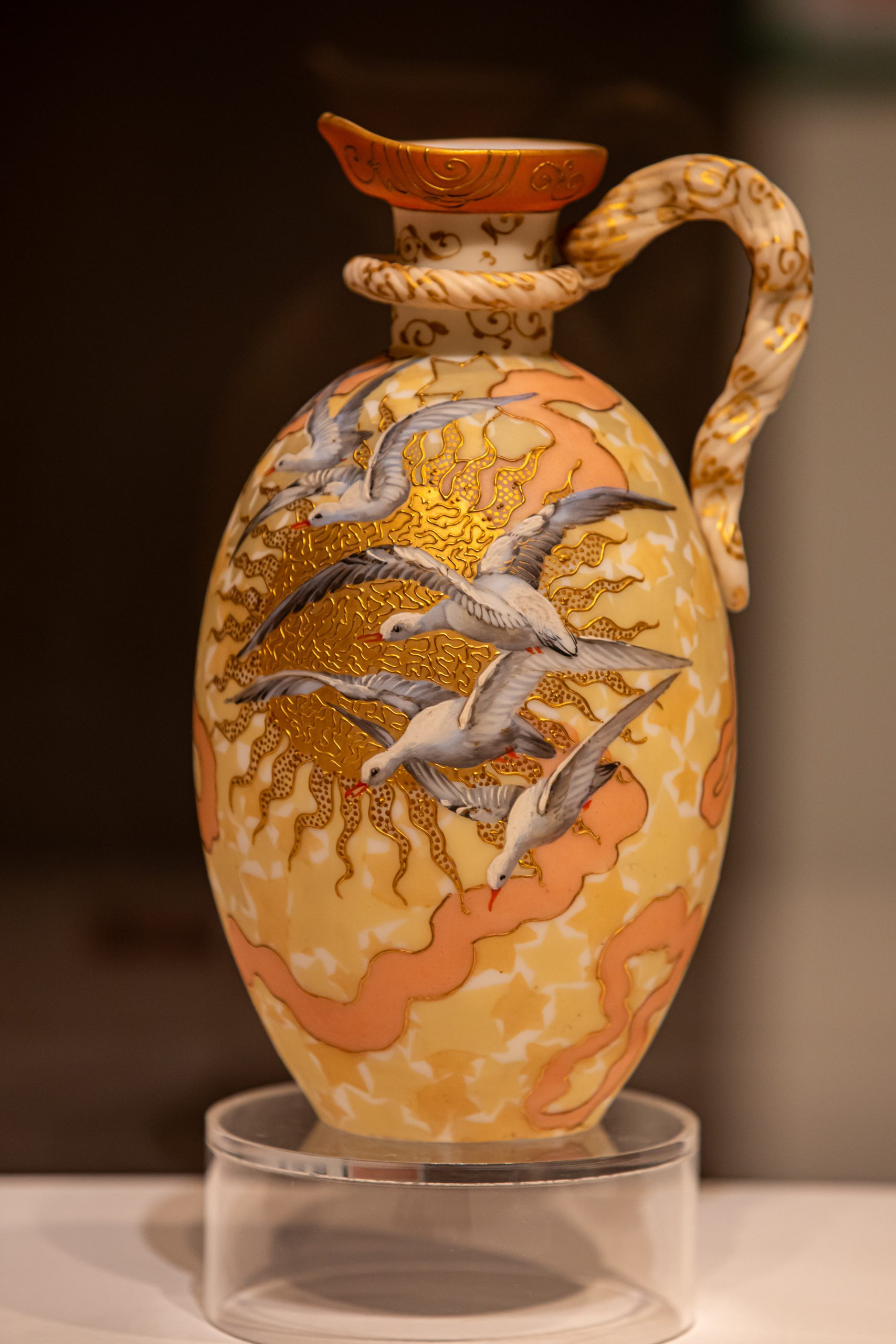 Decorative pitcher featuring seagulls on the body.
