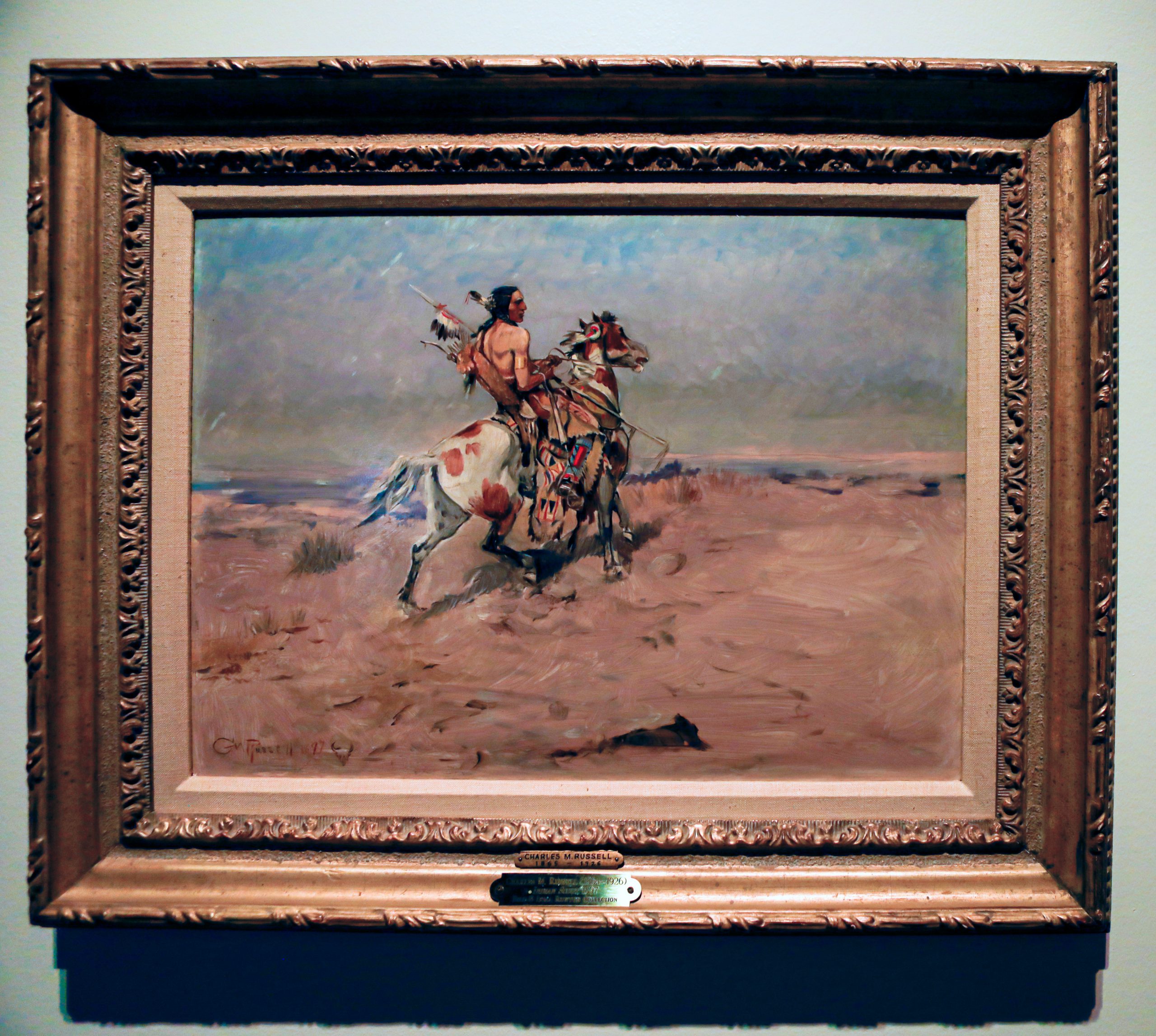 Oil painting of a Native American on horseback. This image shows the painting as it would look under modern lighting.