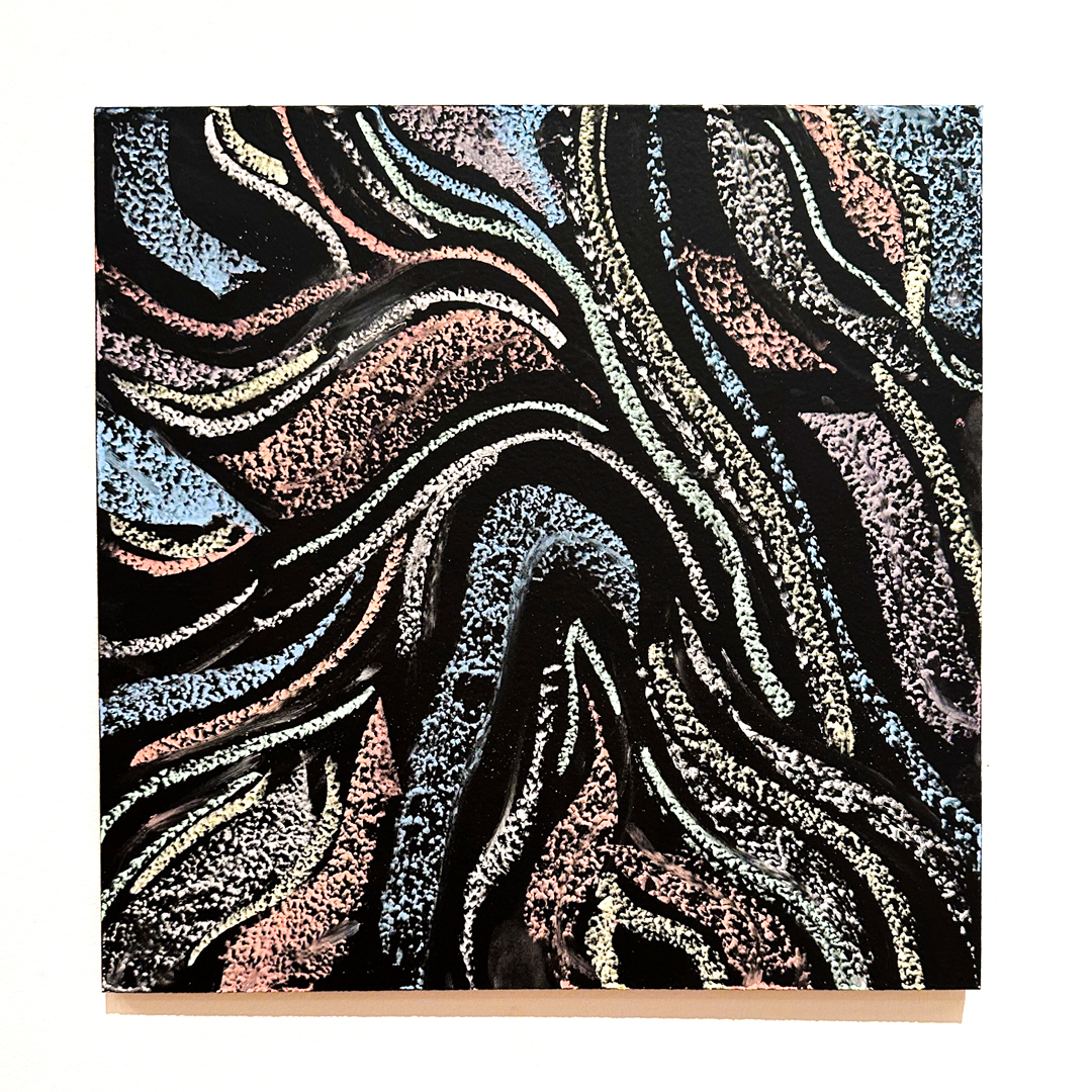 Abstract chalk art of lines and swirls of various colors