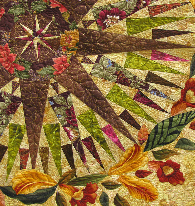 Detail of a quilt with a 64-point compass in the middle